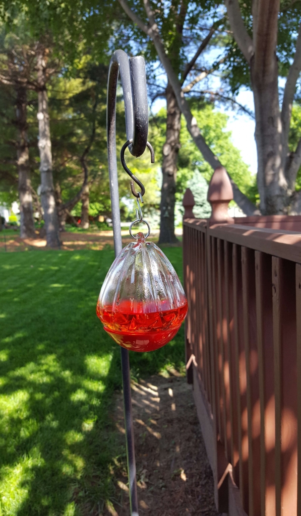 Red hummingbird feeder