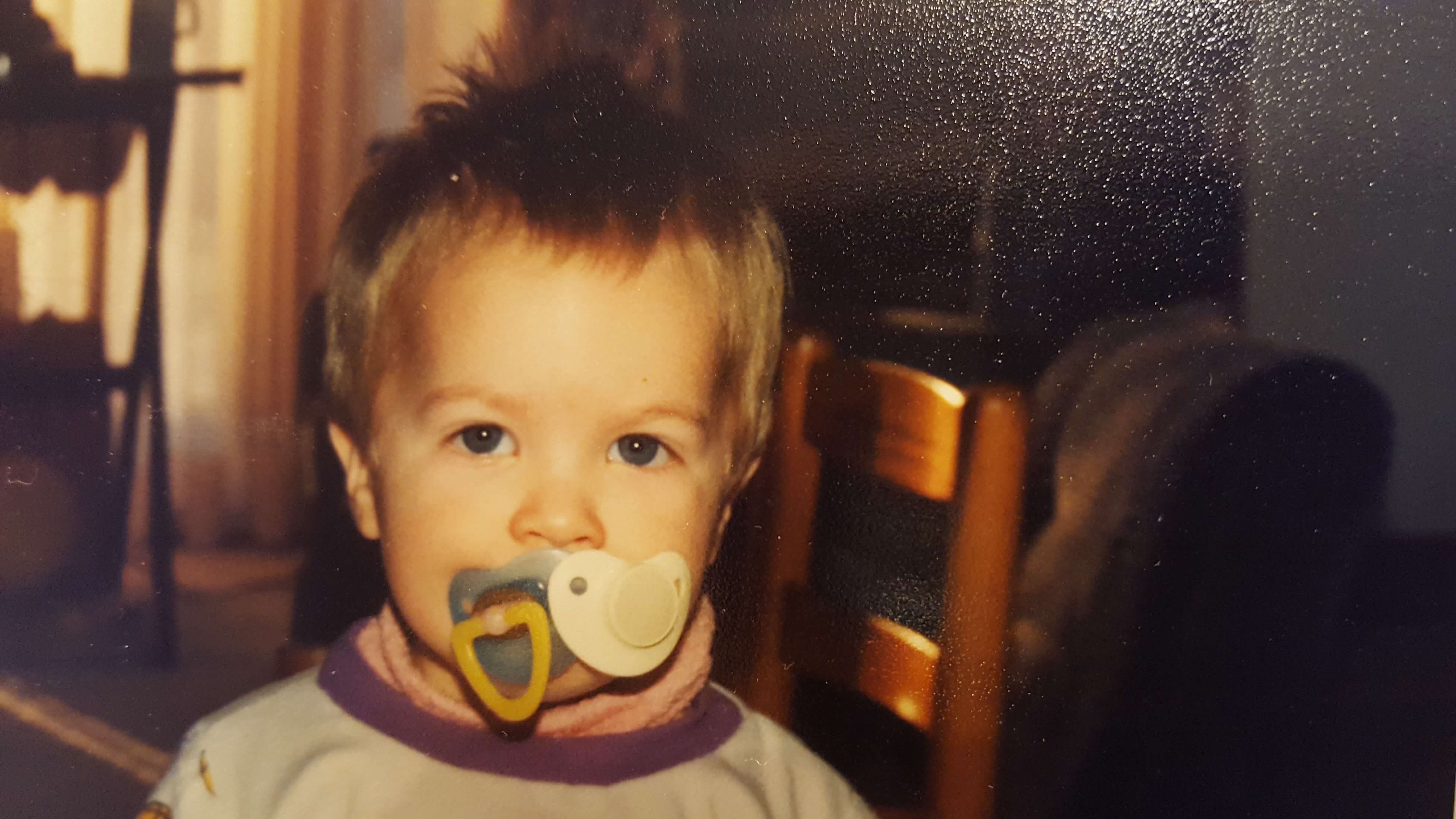 Baby with 2 pacifiers