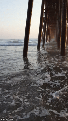 Waves coming in under Oceanside Pier