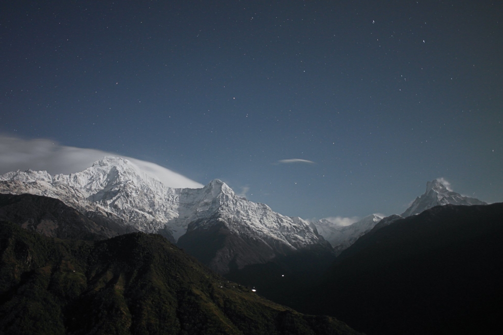 Peaceful icy mountains and evening sky